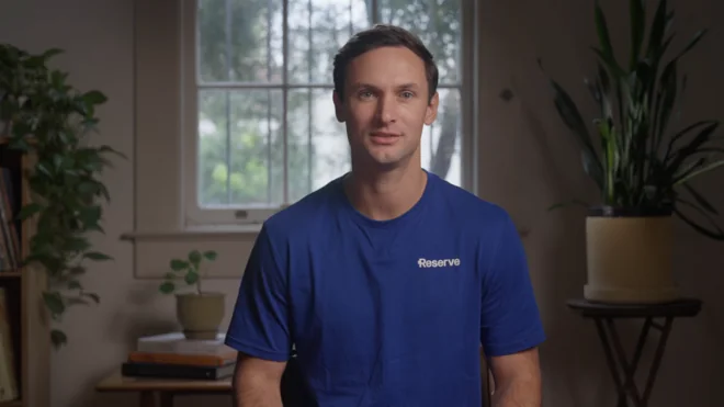 Reserve&rsquo;s former CEO to camera in a Reserve t-shirt, explaining DTFs.